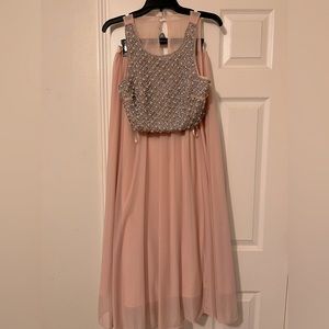 Light pink formal two piece dress.